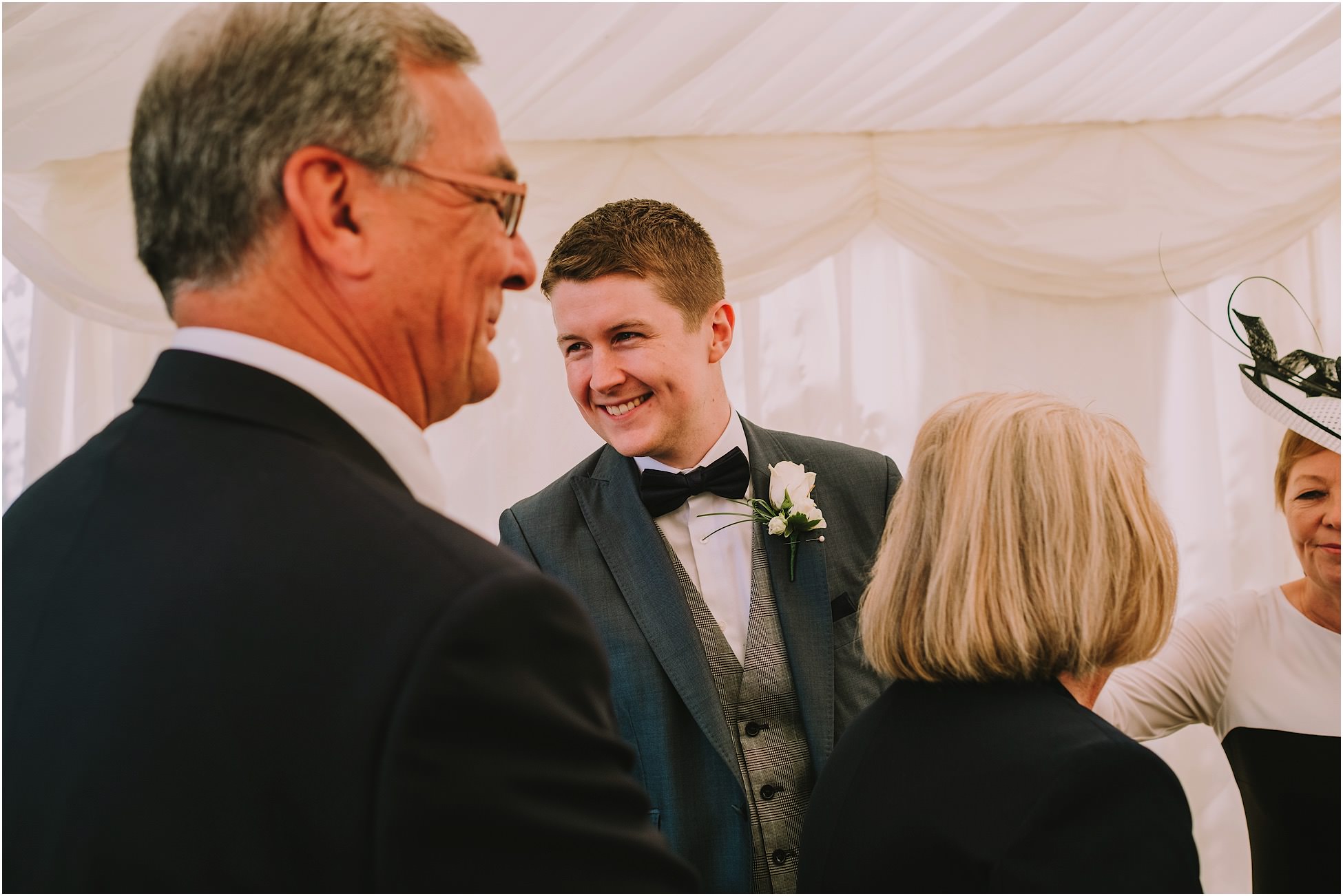 Groom speaking to the guests at a wedding reception